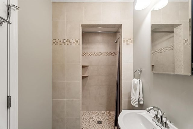63 Prospect St Unit 2, Woburn, MA 01801 - full bathroom featuring a stall shower and a sink
