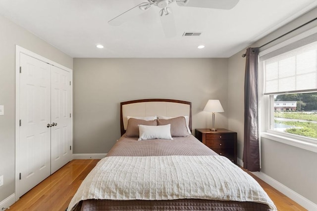 63 Prospect St Unit 2, Woburn, MA 01801 - bedroom with light wood-style flooring, baseboards, recessed lighting, a closet, and ceiling fan