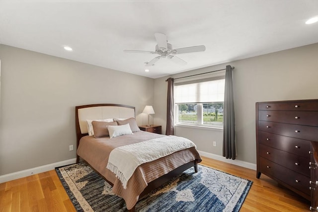 63 Prospect St Unit 2, Woburn, MA 01801 - bedroom with light wood finished floors, baseboards, recessed lighting, and ceiling fan