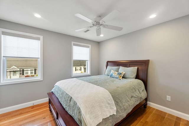 63 Prospect St Unit 2, Woburn, MA 01801 - bedroom with baseboards, wood finished floors, ceiling fan, and recessed lighting