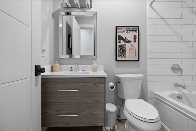 full bathroom with vanity, toilet, and tiled shower / bath combo