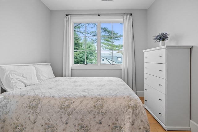 bedroom featuring light hardwood / wood-style flooring