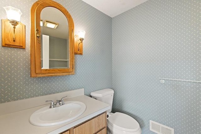 126 Willard St Unit D, Lowell, MA 01850 - half bath featuring toilet and vanity