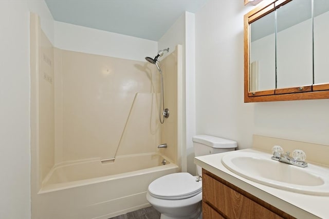 126 Willard St Unit D, Lowell, MA 01850 - full bath with vanity, tub / shower combination, toilet, and wood finished floors
