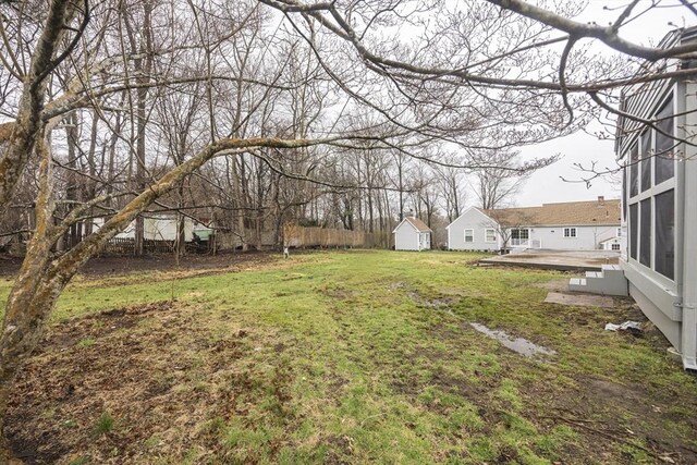 6 Nemasket St, Middleboro, MA 02346 - view of yard with an outdoor structure, a wooden deck, and a shed