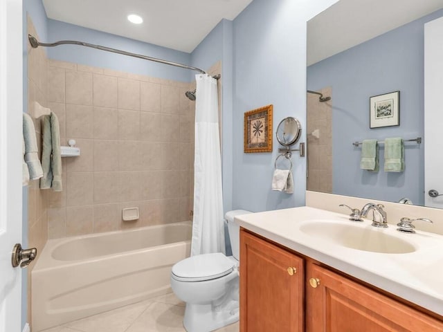 full bathroom featuring tile patterned flooring, shower / bath combo, vanity, and toilet