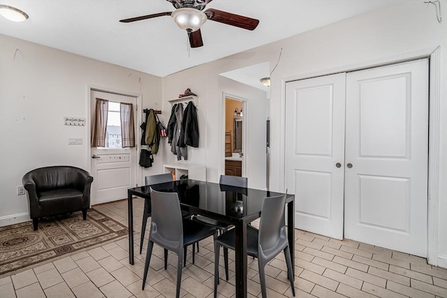 dining area with ceiling fan