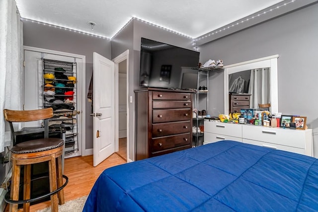 bedroom with wood finished floors