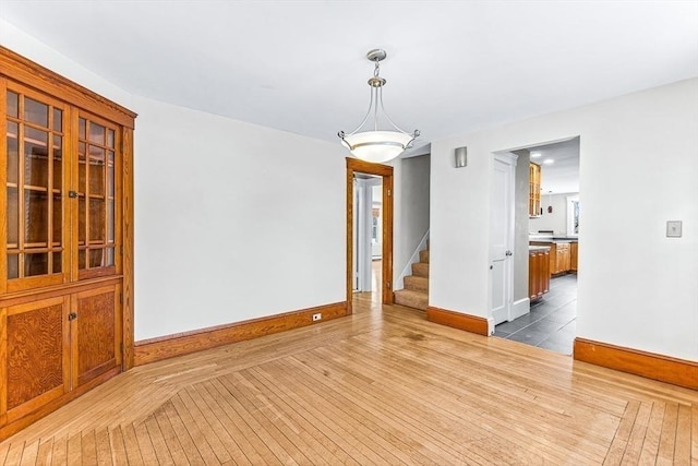 empty room featuring wood-type flooring