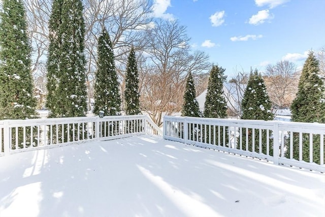 view of snow covered deck