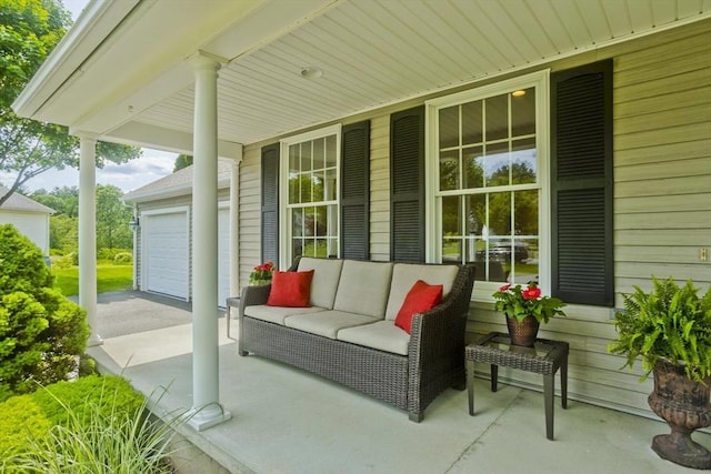 47 Avis Cir, Northampton, MA 01062 - covered porch featuring a garage
