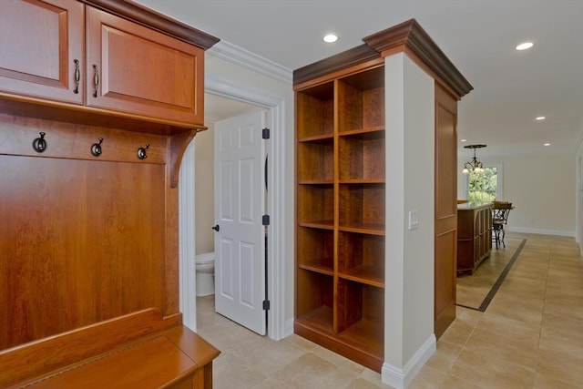 47 Avis Cir, Northampton, MA 01062 - mudroom with crown molding, baseboards, light tile patterned floors, recessed lighting, and a chandelier