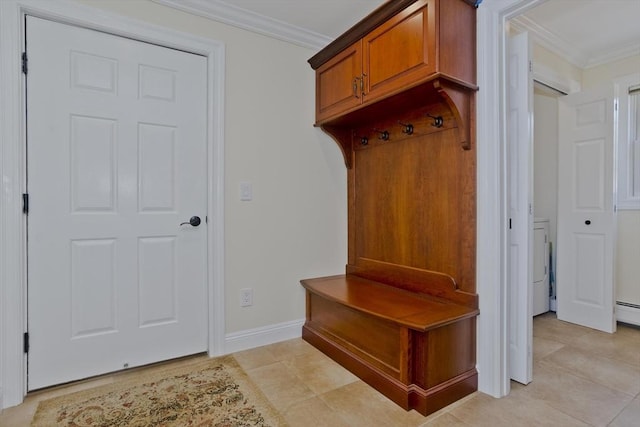 47 Avis Cir, Northampton, MA 01062 - mudroom with ornamental molding, light tile patterned floors, baseboards, and a baseboard radiator