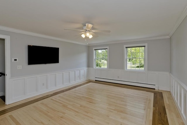 47 Avis Cir, Northampton, MA 01062 - unfurnished room featuring a baseboard heating unit, a ceiling fan, hardwood / wood-style floors, a wainscoted wall, and ornamental molding