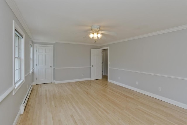 47 Avis Cir, Northampton, MA 01062 - empty room featuring baseboard heating, light wood-type flooring, ceiling fan, baseboards, and crown molding