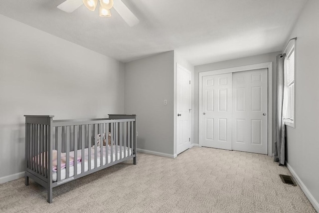 1702 Lewis O Gray Dr Unit 1702, Saugus, MA 01906 - bedroom with carpet floors, a closet, a ceiling fan, and a nursery area