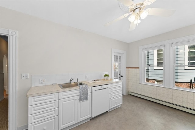 85 Holworthy Unit 85, Cambridge, MA 02138 - kitchen with white dishwasher, a baseboard radiator, a ceiling fan, light countertops, and light carpet