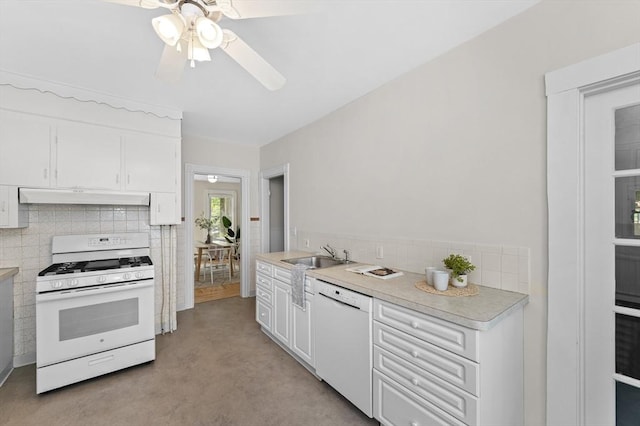 85 Holworthy Unit 85, Cambridge, MA 02138 - kitchen with white appliances, under cabinet range hood, tasteful backsplash, ceiling fan, and light countertops