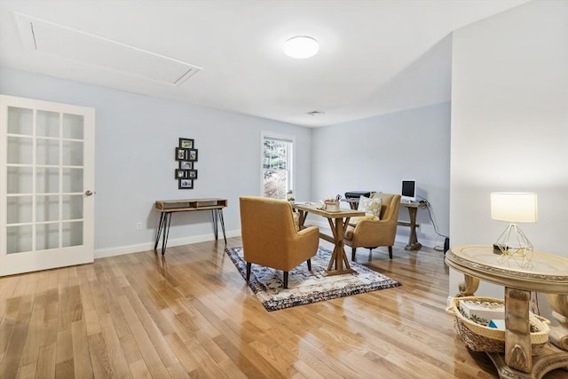 dining space featuring wood-type flooring