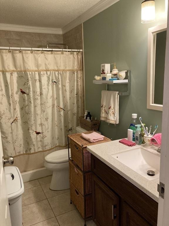 2 Summit Dr Unit 18, Reading, MA 01867 - full bathroom featuring toilet, vanity, crown molding, a textured ceiling, and tile patterned flooring