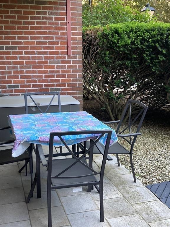 2 Summit Dr Unit 18, Reading, MA 01867 - view of patio / terrace with outdoor dining space