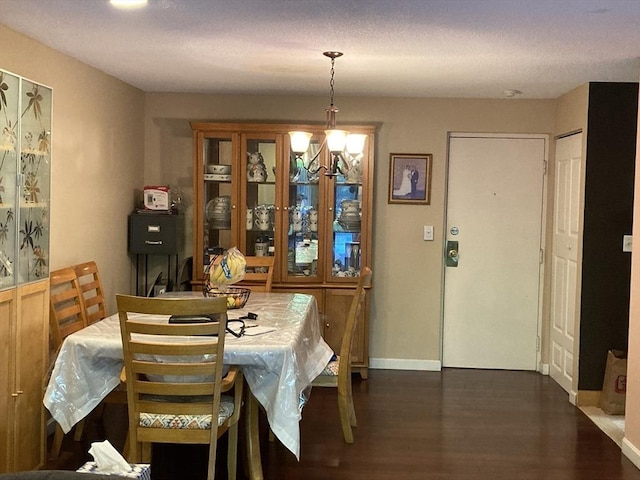 2 Summit Dr Unit 18, Reading, MA 01867 - dining space with dark wood-style floors, a chandelier, and baseboards