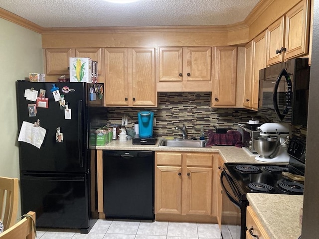 2 Summit Dr Unit 18, Reading, MA 01867 - kitchen featuring black appliances, light countertops, a sink, crown molding, and backsplash