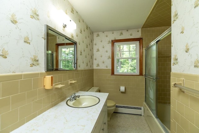 4 Morningside Dr, Beverly, MA 01915 - bathroom with a baseboard radiator, tile walls, tile patterned floors, vanity, and a wainscoted wall
