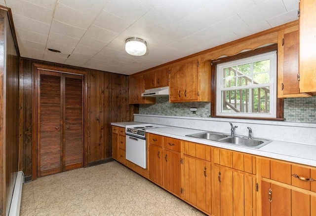 4 Morningside Dr, Beverly, MA 01915 - kitchen with electric stove, a sink, light countertops, under cabinet range hood, and a baseboard radiator