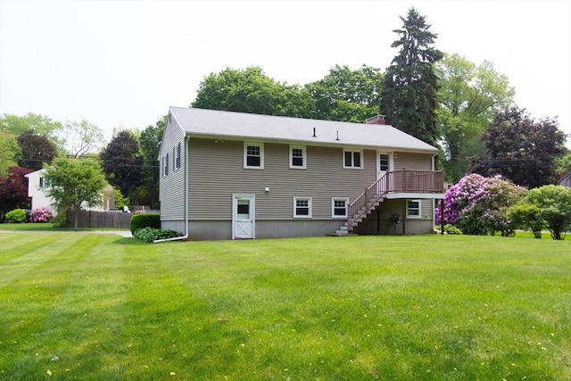4 Morningside Dr, Beverly, MA 01915 - rear view of property with stairway, a lawn, and a deck