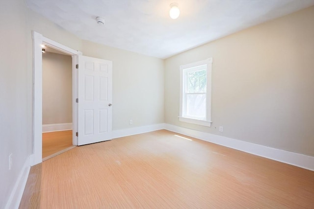 20-22 Ashland Ave, Methuen, MA 01844 - unfurnished room with light wood finished floors, baseboards, and a smoke detector