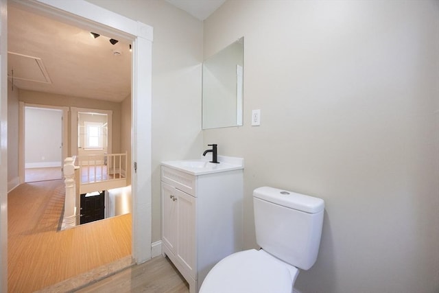 20-22 Ashland Ave, Methuen, MA 01844 - bathroom featuring wood finished floors, toilet, and vanity