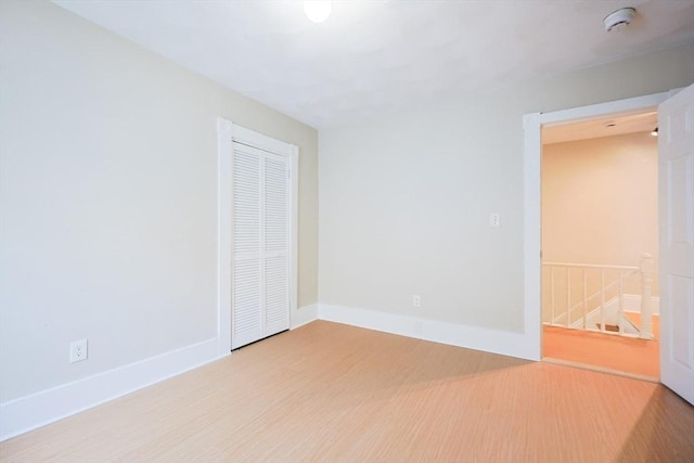 20-22 Ashland Ave, Methuen, MA 01844 - empty room with light wood-type flooring, baseboards, and a smoke detector
