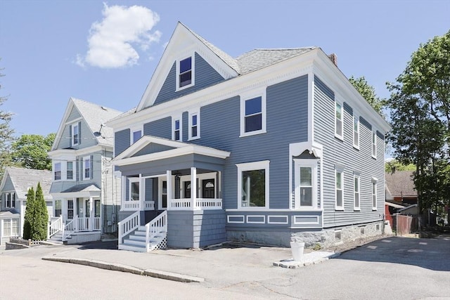 20-22 Ashland Ave, Methuen, MA 01844 - american foursquare style home with covered porch and a chimney