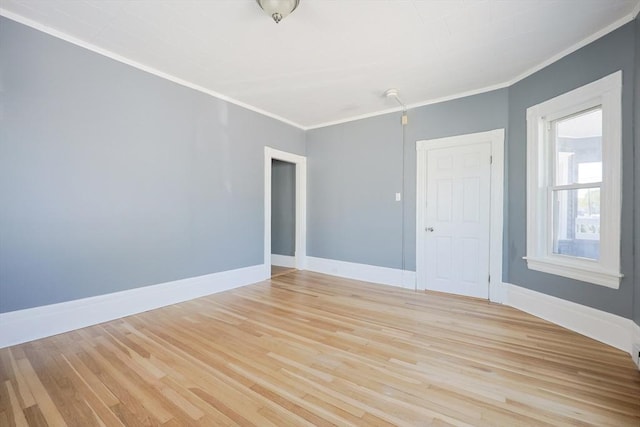 20-22 Ashland Ave, Methuen, MA 01844 - unfurnished room with crown molding, light wood-style floors, and baseboards