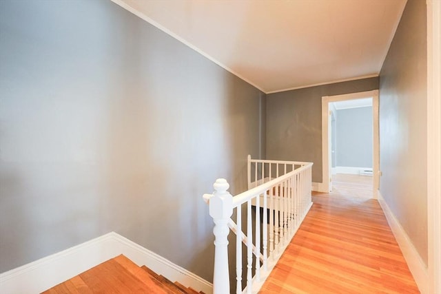 20-22 Ashland Ave, Methuen, MA 01844 - hall with an upstairs landing, light wood-type flooring, baseboards, and ornamental molding