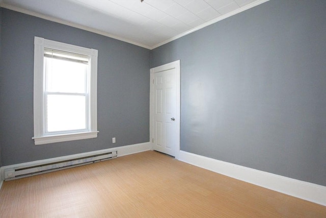 20-22 Ashland Ave, Methuen, MA 01844 - unfurnished room featuring baseboard heating, crown molding, and baseboards