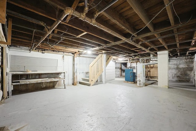 20-22 Ashland Ave, Methuen, MA 01844 - unfinished below grade area with stairway and gas water heater