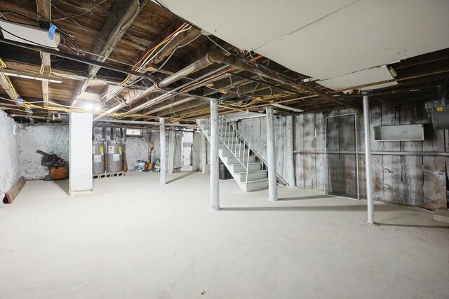 20-22 Ashland Ave, Methuen, MA 01844 - unfinished basement with stairs and water heater