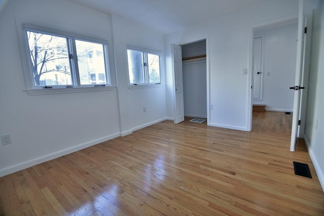 unfurnished bedroom featuring light hardwood / wood-style flooring