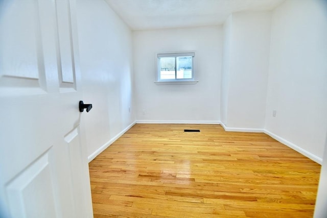 empty room featuring light hardwood / wood-style floors