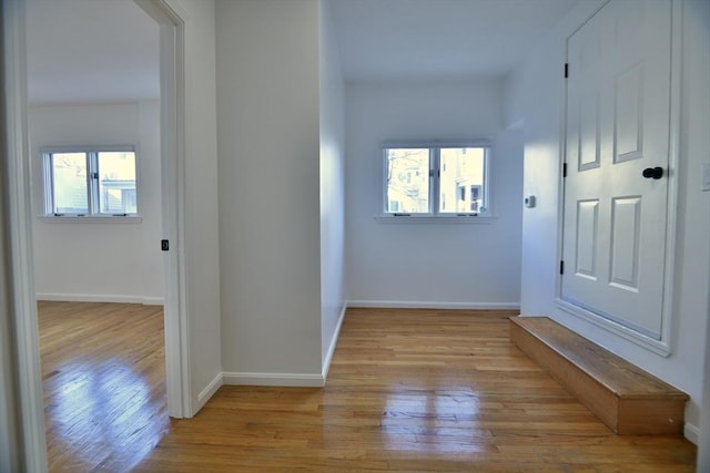 hallway featuring light wood-type flooring