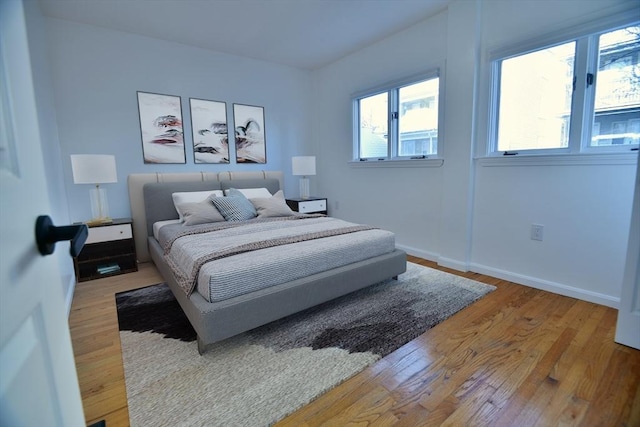 bedroom featuring hardwood / wood-style floors