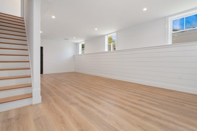 basement featuring light wood-type flooring