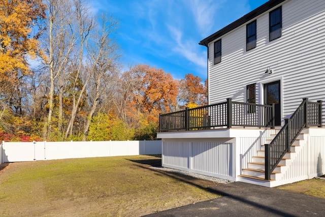 view of yard featuring a wooden deck