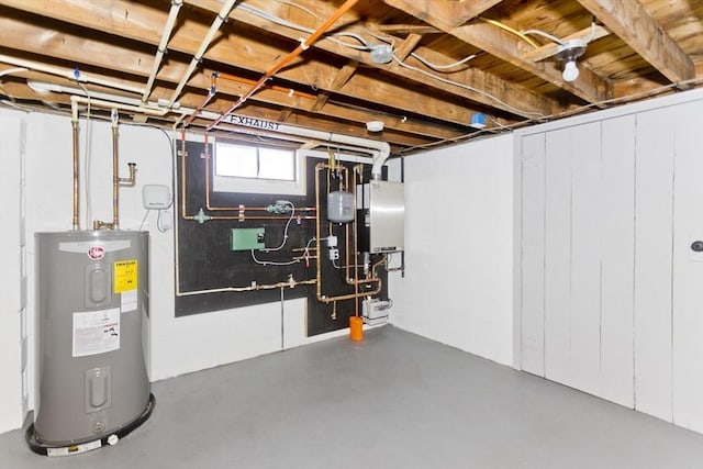 basement with water heater and electric water heater