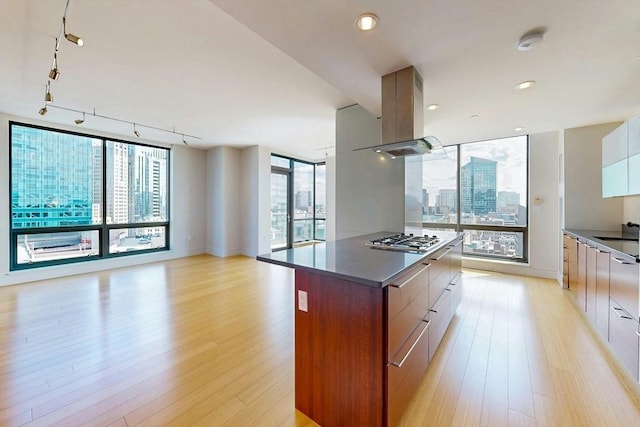 45 Province St Unit U1602, Boston, MA 02108 - kitchen with modern cabinets, dark countertops, and rail lighting