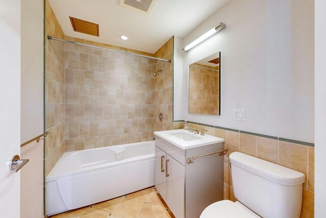 45 Province St Unit U1602, Boston, MA 02108 - bathroom featuring toilet, vanity, tile walls,  shower combination, and tile patterned floors