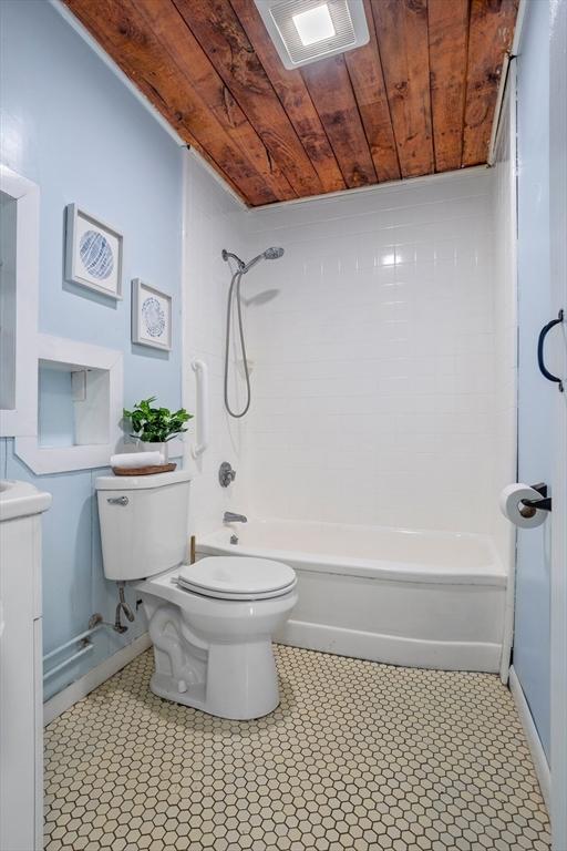 full bath featuring shower / washtub combination, wooden ceiling, visible vents, and toilet