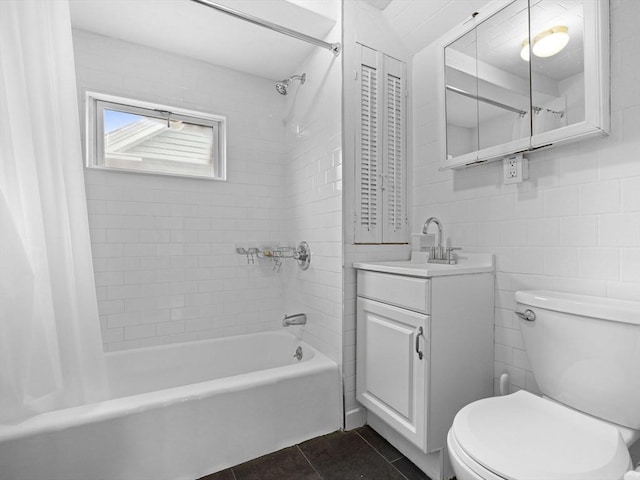 9-11 Edmunds St, Cambridge, MA 02140 - bathroom with shower / tub combo, tile patterned floors, vanity, and toilet